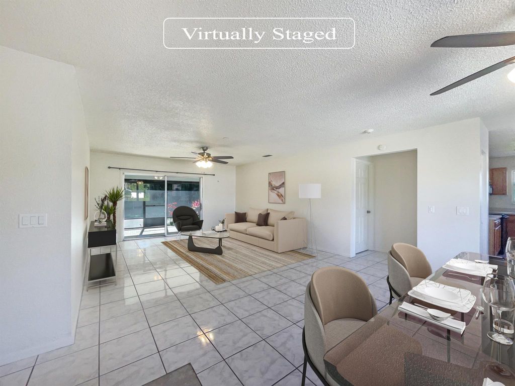 Photo of 2913 SW Bridge Street, Port Saint Lucie, FL 34953 (MLS # R10967928)