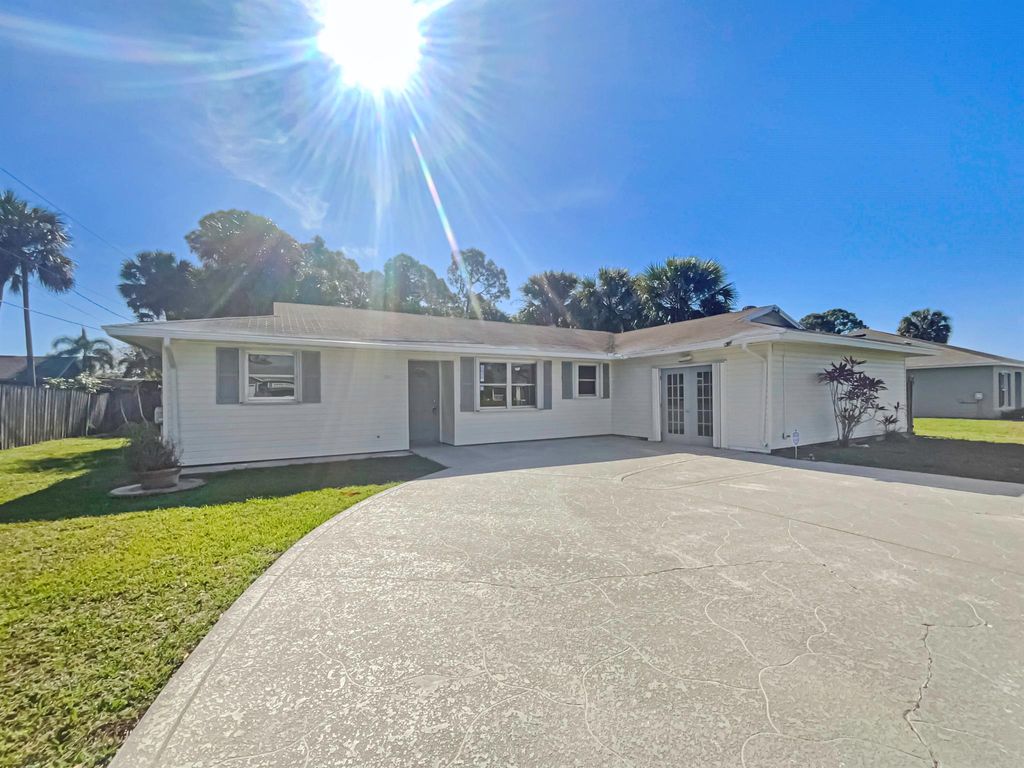 Photo of 2913 SW Bridge Street, Port Saint Lucie, FL 34953 (MLS # R10967928)