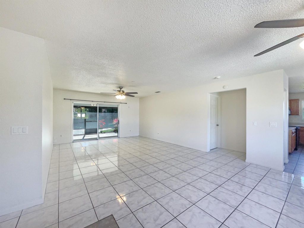 Photo of 2913 SW Bridge Street, Port Saint Lucie, FL 34953 (MLS # R10967928)