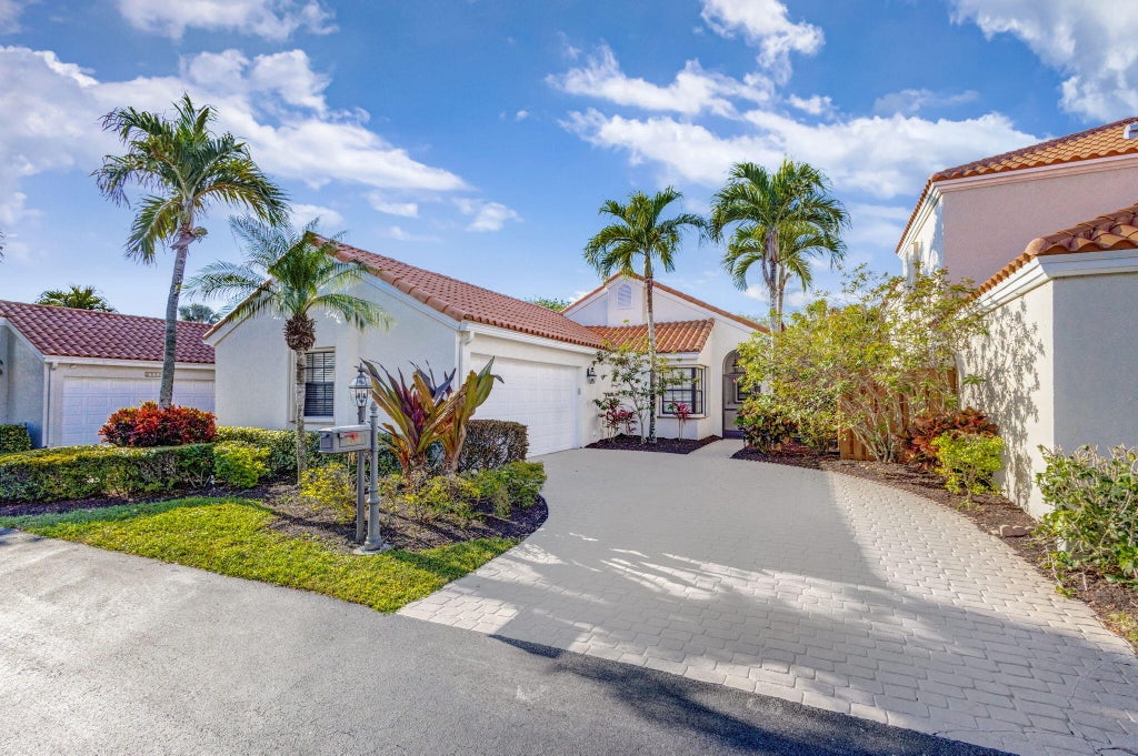 Photo of 2556 La Cristal Circle, Palm Beach Gardens, FL 33410 (MLS # R11074490)
