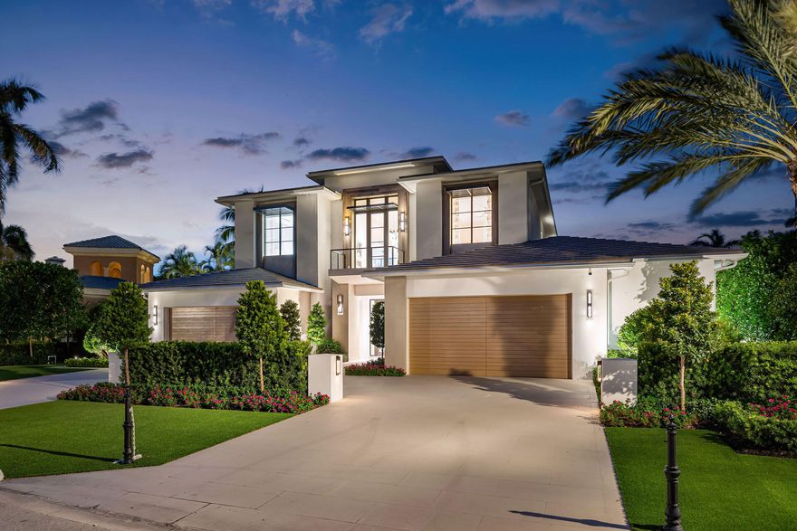 Located in the prestigious Royal Palm Yacht & Country Club, this extraordinary residence, meticulously crafted by Bloomfield Construction Inc., redefines luxury living. Encompassing 10,146 square feet, this fully furnished estate offers breathtaking views of multiple Jack Nicklaus Signature golf course fairways.
The property features five exquisite bedroom suites, including a first-floor master suite, six full bathrooms, and two half bathrooms. The master suite showcases both his and her bathrooms; each outfitted with lavish steam showers for ultimate relaxation. Designed with convenience and style, the estate also boasts a four-car garage equipped with air conditioning and EV charging stations, ensuring comfort and functionality. The driveway, constructed with a durable concrete base and finished with porcelain, exudes sophistication and longevity.

For those who value modern conveniences, the home offers cutting-edge smart home technology, seamlessly integrating security, climate, and entertainment systems alongside advanced water detection systems for peace of mind. The interior spaces are complemented by a club room, a gym, and dual kitchensone designed for gourmet creations and the other for outdoor summer entertaining.

Unwind in the expansive swimming pool and spa, or savor a fine vintage from the 388-bottle wine room. This property is ideally suited for entertaining, with multiple gathering spaces that flow effortlessly throughout the home. Every detail is curated, offering a move-in-ready experience in Boca Raton's premier enclave. The buyer is responsible for documentary stamp taxes and title insurance.