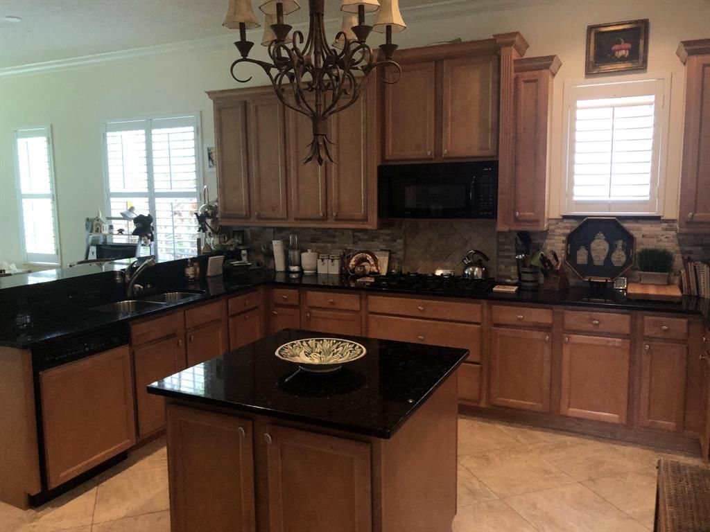 Photo of 957 Mill Creek Drive, Palm Beach Gardens, FL 33410 (MLS # R10758014)