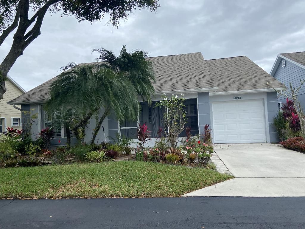 Photo of 311 NW Tuscany Lane, Port Saint Lucie, FL 34986 (MLS # R10996116)