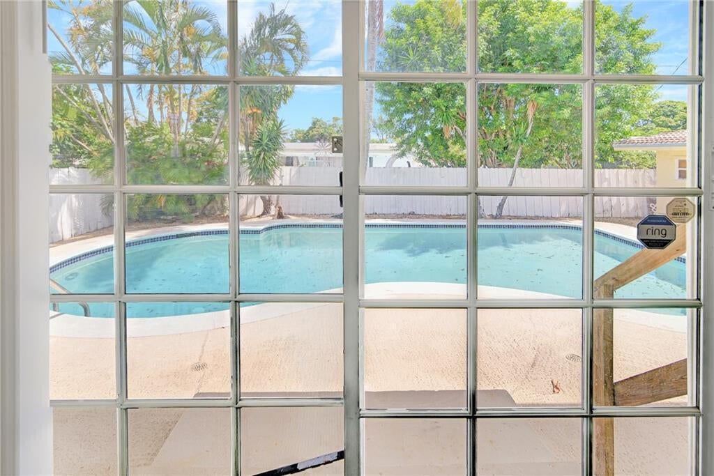 Photo of 71 NE 56th Court, Oakland Park, FL 33334 (MLS # B26080129)