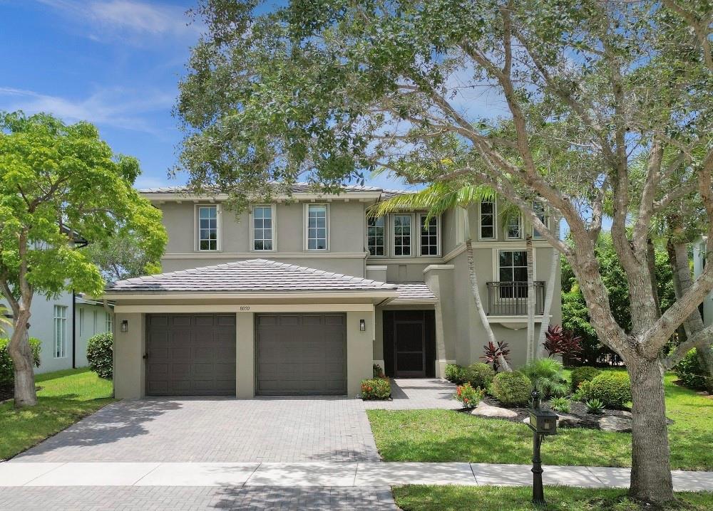 Beautifully renovated St. John Expanded model in gated Heron Bay. This 2-story 4BR + loft, 3BA home features a private pool, fenced yard, and 2-car garage with Tesla EV charger. Updated kitchen with white quartz countertops, stainless appliances, and open living/family space. Marble tile downstairs, laminate upstairs. First-floor bedroom with full bath. Upstairs offers a large primary suite with balcony, Jack-and-Jill bedrooms, loft, and laundry room with sink. Updates include pool refinished (2024), pool pump (2021), water heater (2019), 2 impeccably maintained AC units (2016), garage storage, and insulated attic. Upgraded Modern Light Fixtures & Custom Window Treatments, Low HOA Dues: 2 Resort-Style Clubhouses w/Tennis, Fitness Center, 24-Hour Guard Gated, & A+ Schools!