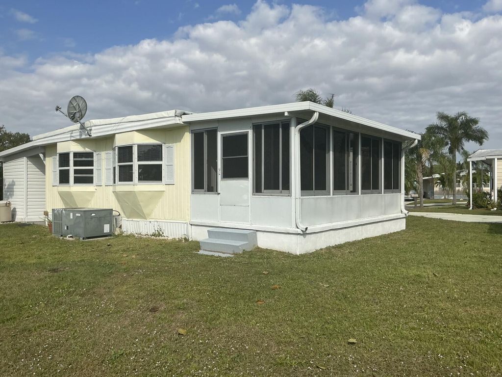 Photo of 5 La Paloma Ln, Port Saint Lucie, FL 34952 (MLS # R11060365)