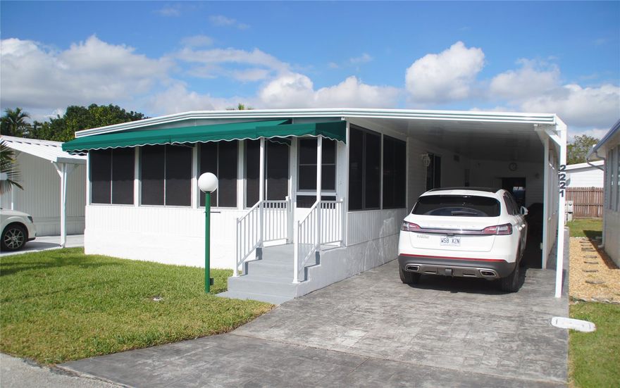 AVAILABLE MARCH 31, 2024 - OWN THE LAND...!!! AND MOVE RIGHT IN THIS DELIGHTFUL 2 BED 2 BATH MANUFACTURED HOME LOCATED IN DESIRABLE RAVENSWOOD ESTATES..!! FULLY FURNISHED. CERAMIC FLOORS..!! PATIO DOOR IN THE KITCHEN LEADING TO THE ENCLOSED CARPORT SITTING AREA WHERE YOU CAN ENJOY YOUR MORNING COFFEE OR A RELAXING DINNER..!! LARGE SHED WITH WASHER/DRYER - LARGE BACKYARD PARTIALLY FENCED FOR PRIVACY..!!THE COMMUNITY OFFERS: OLYMPIC SIZE SWIMMING POOL, TENNIS, ACTIVITIES & MORE..!!   CLOSE TO SHOPPING, HARD ROCK CASINO, 4 MILES FROM THE BEACH AND GREAT RESTAURANTS...!!!  LOW MAINTENANCE...!!! DON’T DELAY, SCHEDULE YOUR PRIVATE VIEWING TODAY...!! OWN THE LAND…!!! ONLY $70 PER MONTH FOR POOL, TENNIS, AND MORE…!!! GREAT COMMUNITY, GREAT PRICE, GREAT VALUE… SEE IT TODAY..!!