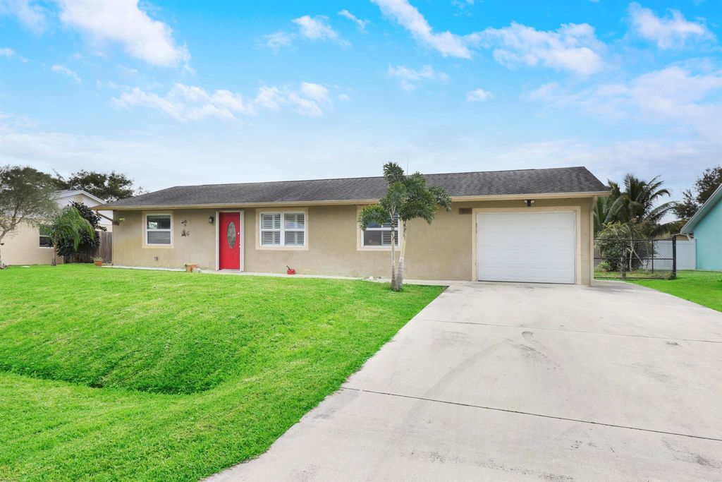 Photo of 932 SE Belfast Avenue, Port Saint Lucie, FL 34983 (MLS # R10947370)