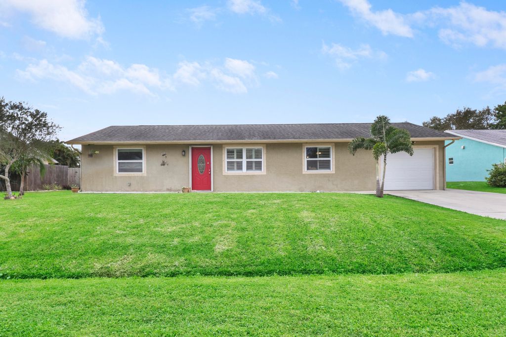 Photo of 932 SE Belfast Avenue, Port Saint Lucie, FL 34983 (MLS # R10947370)