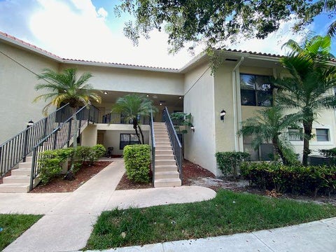 Photo of 1601 Windorah Way #G, West Palm Beach, FL 33411 (MLS # B26089393)