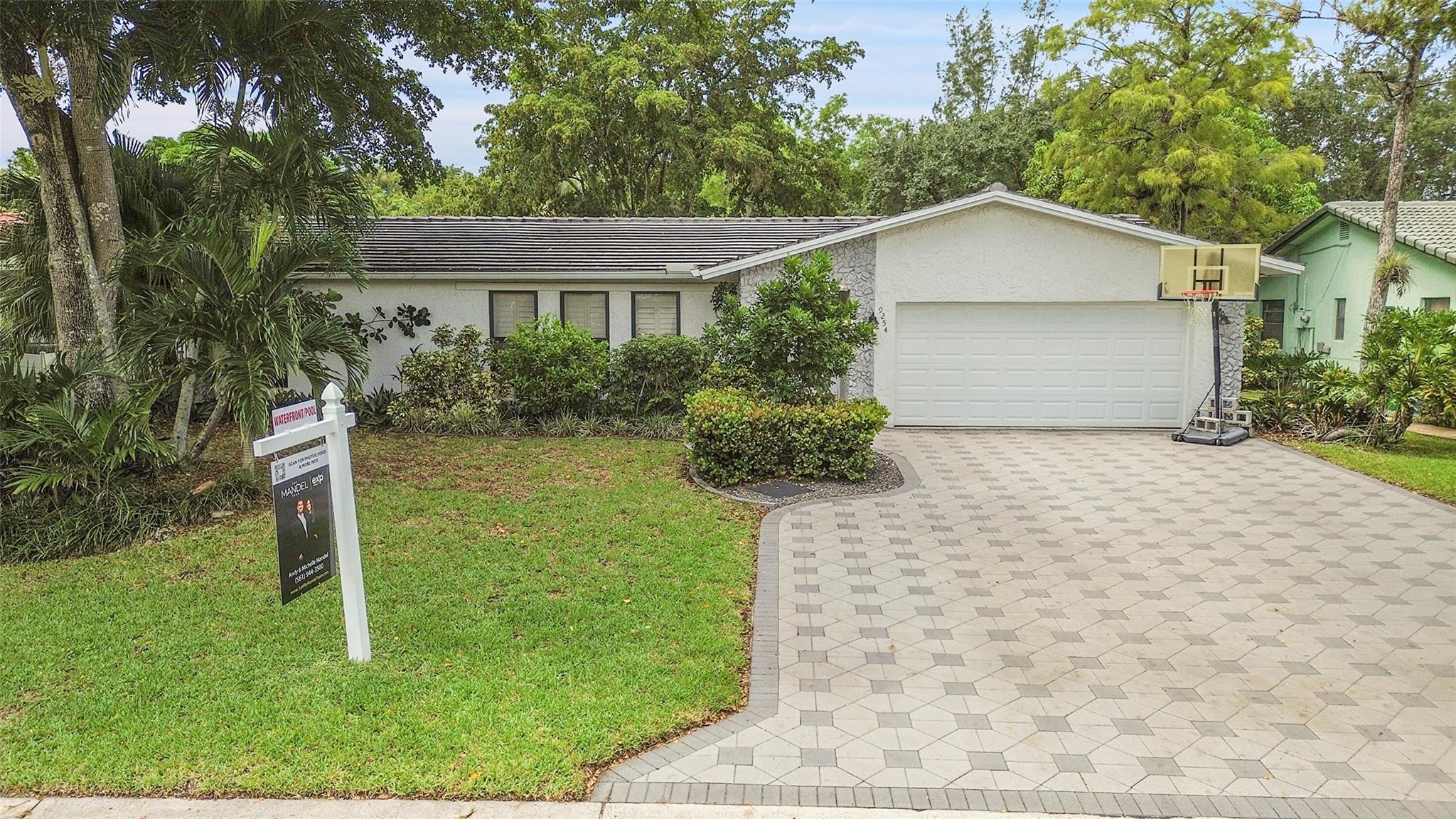 Updated house in the highly desirable Ramblewood neighborhood. All the big things are done in this house - IMPACT WINDOWS, ROOF (2017), AC (2018), WATER HEATER (2017). Kitchen has been remodeled with white shaker cabinets, quartz counters, & stainless steel appliances. Both bathrooms have been updated with modern tile & vanities. Master bedroom features a large walk-in closet with tons of storage. Enjoy your tropical paradise on this 10,000 sq ft lot with peaceful water views & no rear neighbors for unlimited privacy. Minutes away from shopping, restaurants, and with easy access to the Turnpike, 95, & Sawgrass Expressway. Excellent rated school system and NO HOA!