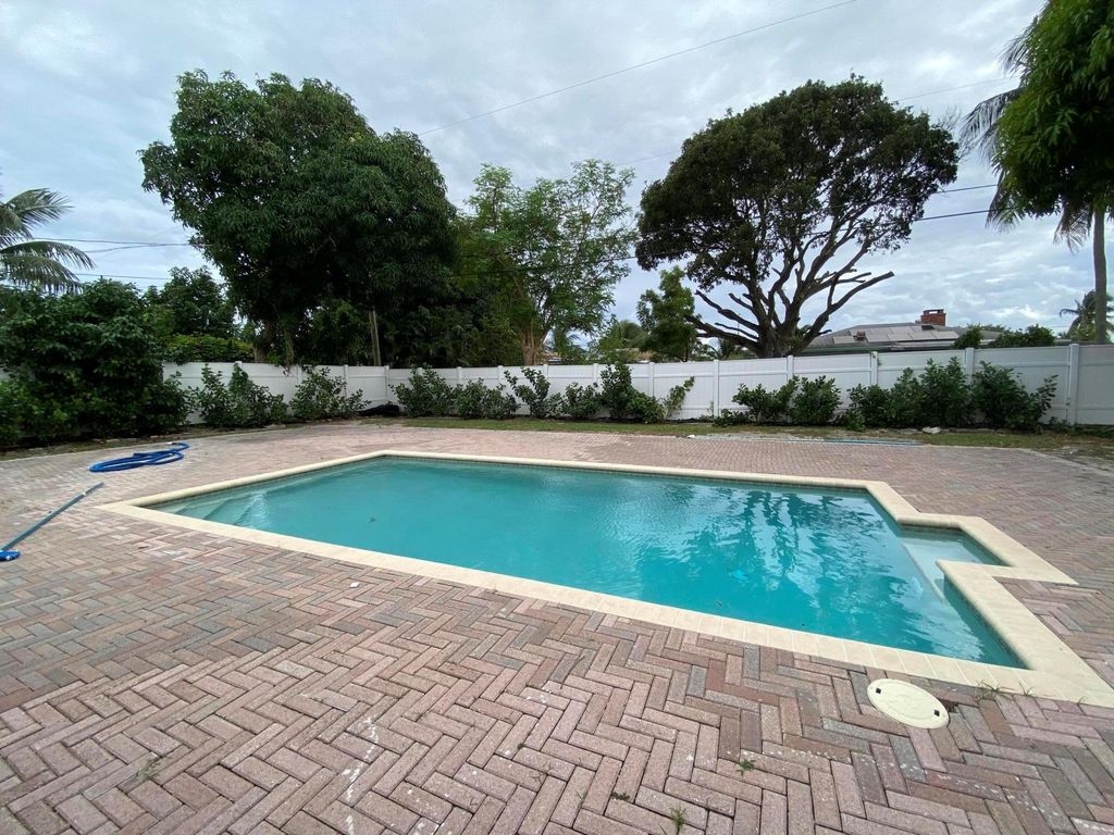 Photo of 330 Cypress Drive #Unit C, Lake Park, FL 33403 (MLS # R11136013)