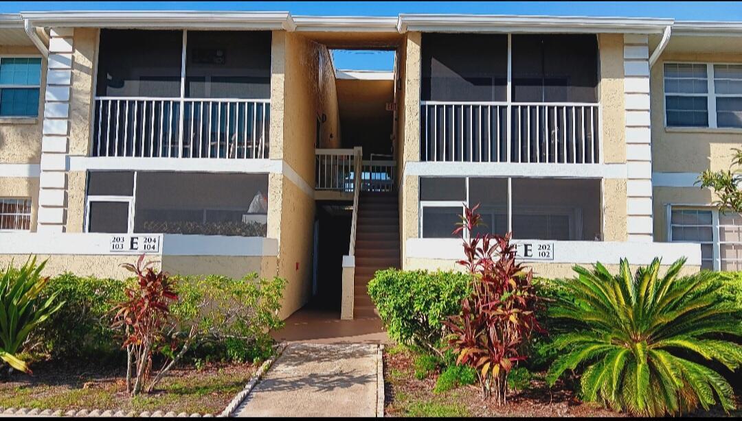 Condo 2/2. Great View of garden & trees from the screened in Patio. NO PARKING LOT VIEW! Larger Unit of 2/2. Few steps from the Pool. 2nd FLR; A/C REPLACED 2024. WATER HEATER REPLACED 2024.Large tiles throughout: 19X19. NO CARPET! Refrigerator replaced in 2023. Backsplash in Kitchen. Chestnut colored cabinets. Lazy Suzan Cabinet.Breakfast Bar seating area.Large Size Vanities for Extra Storage with soft closing cabinet doors in bathrooms.Ceiling fans with lights in every room. French doors to Primary Bedroom Suite. Enjoy the convenience of in-unit washer/dryer. Pet friendly w/restriction. Trucks allowed. Rental allowed. No wait period. Outdoor heated Pool. Water is included in HOA Fees, maintenance, landscaping, Building