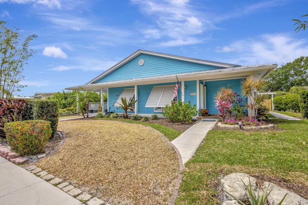 Photo of 2940 SE Treasure Island Road, Port Saint Lucie, FL 34952 (MLS # B26005955)