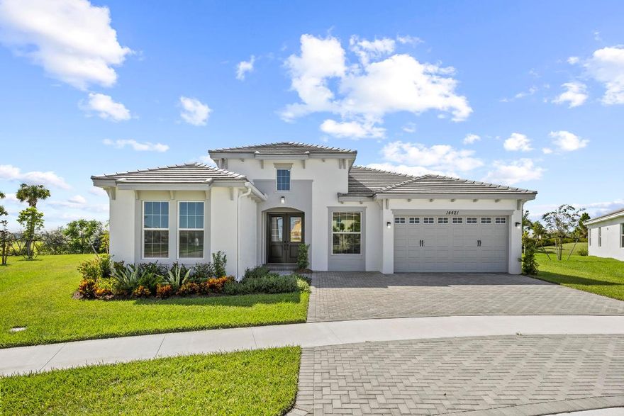 Live the luxury lifestyle in this brand-new, never-lived-in *Sanderling Grand* model located in the sought-after community of Westlake, Florida. This spacious single-story home features 5 bedrooms, 4 bathrooms, a versatile Hobby Room, and a 2-car garage—perfectly situated on an oversized pie-shaped cul-de-sac lot offering a private sanctuary setting with no rear neighbors and a tranquil lake view from the side of the home.

Step inside to discover a bright, open layout with soaring ceilings and abundant natural light. The home features beautiful laminate flooring throughout the main living areas and plush carpet in the bedrooms for added comfort. The upgraded gourmet kitchen boasts premium cabinetry, an extended center island, and elegant stone countertops—ideal for both everyday living and entertaining guests.
The private owner's suite overlooks the peaceful backyard and includes a spa-inspired bathroom and a generous walk-in closet. Four additional bedrooms plus the Hobby Room offer flexibility for family, guests, a home office, or creative workspace.

Enjoy relaxing evenings in your expansive backyard with endless possibilities, all while surrounded by privacy and nature.

**Community Amenities:**
Experience resort-style living at Westlake's Adventure Park featuring a lagoon-style pool, water slide, splash pad, cabanas, basketball courts, picnic areas, and a dog park.

**Nearby Conveniences:**
Conveniently located near HCA Florida Palms West Hospital, Wellington Regional Medical Center, Wellington ER at Westlake, and a variety of restaurants including Lewis Prime Grill, Il Pomodoro Ristorante, and Fired Up Pizza West. Nearby shopping options include Starbucks, Habit Burger, and more.

Be the first to call this stunning home yoursoffering privacy, luxury, upgrades, and a peaceful setting. Move right in and start enjoying the Westlake lifestyle today!