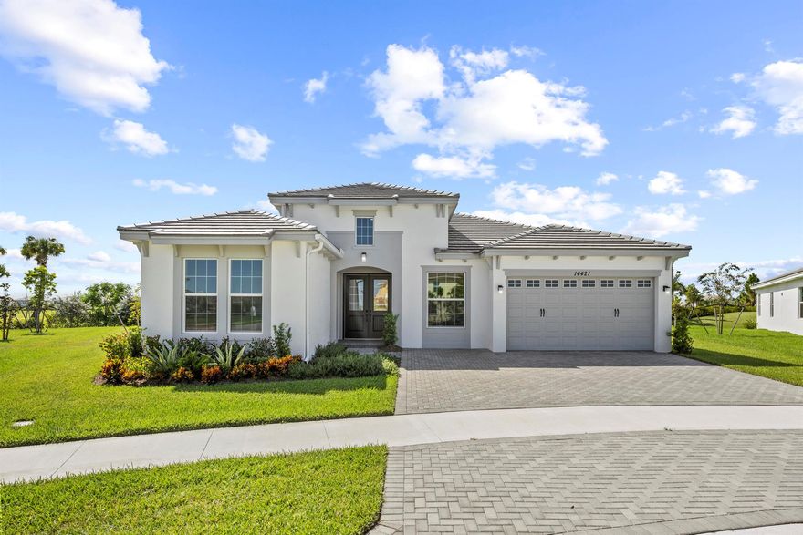 Live the luxury lifestyle in this brand-new, never-lived-in *Sanderling Grand* model located in the sought-after community of Westlake, Florida. This spacious single-story home features 5 bedrooms, 4 bathrooms, a versatile Hobby Room, and a 2-car garage--perfectly situated on an oversized pie-shaped cul-de-sac lot offering a private sanctuary setting with no rear neighbors and a tranquil lake view from the side of the home.Step inside to discover a bright, open layout with soaring ceilings and abundant natural light. The home features beautiful laminate flooring throughout the main living areas and plush carpet in the bedrooms for added comfort. The upgraded gourmet kitchen boasts premium cabinetry, an extended center island, and elegant stone countertops--ideal for both everyday living