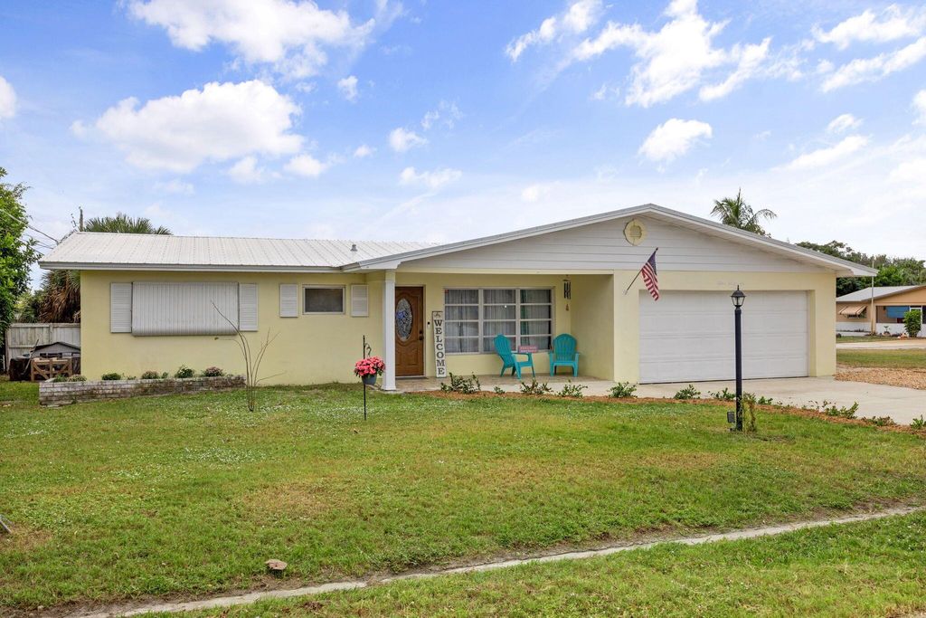 Photo of 1266 NE Flora Place, Jensen Beach, FL 34957 (MLS # R10935585)