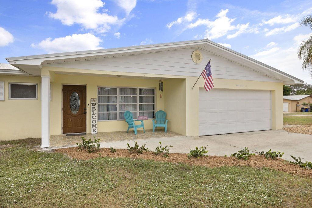 Photo of 1266 NE Flora Place, Jensen Beach, FL 34957 (MLS # R10935585)