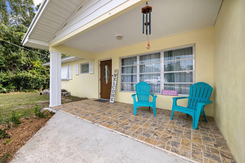 Photo of 1266 NE Flora Place, Jensen Beach, FL 34957 (MLS # R10935585)