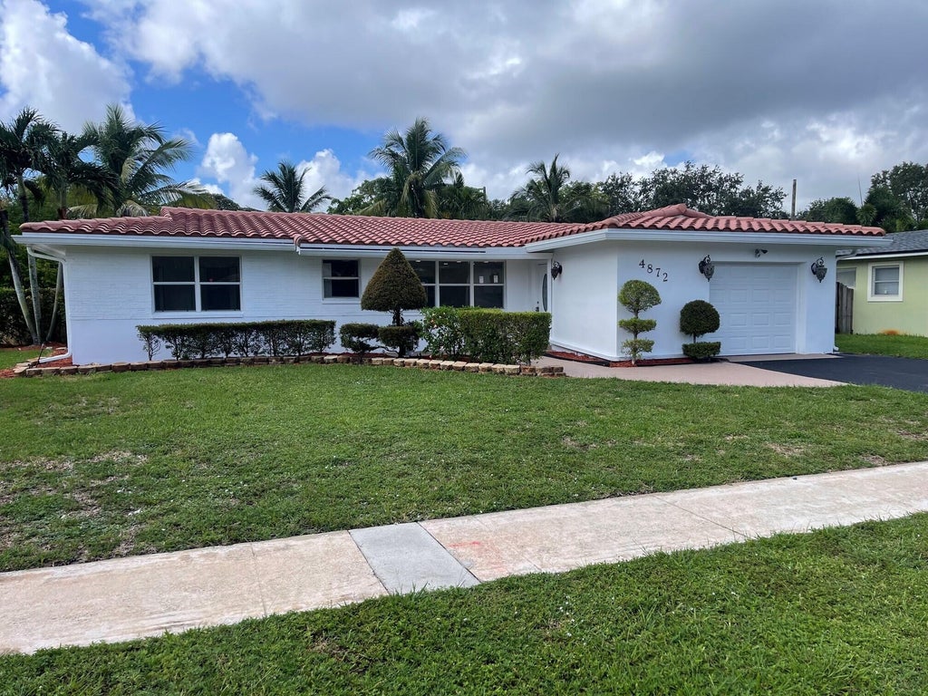 Photo of 4872 NW 6TH Court, Plantation, FL 33317 (MLS # B26055807)