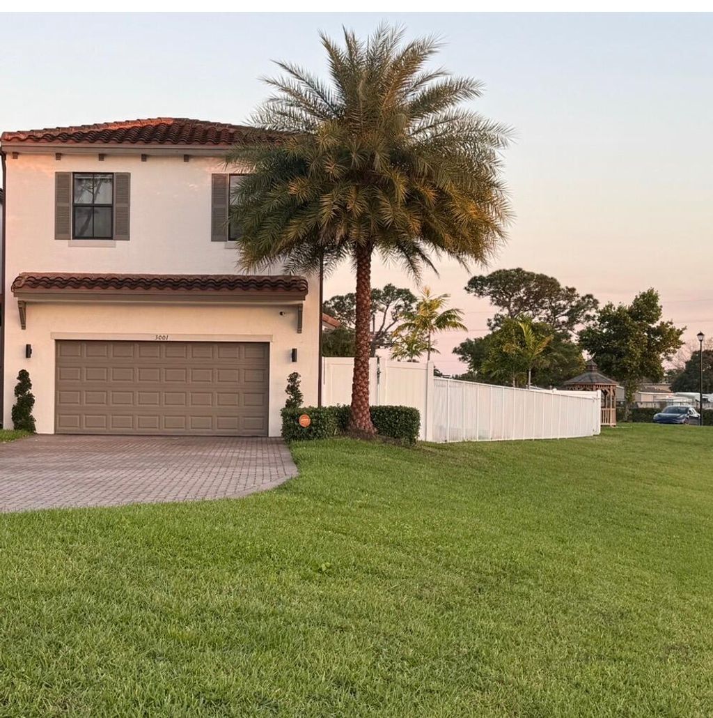 Photo of 3001 King Palm Way, Riviera Beach, FL 33410 (MLS # B26011487)