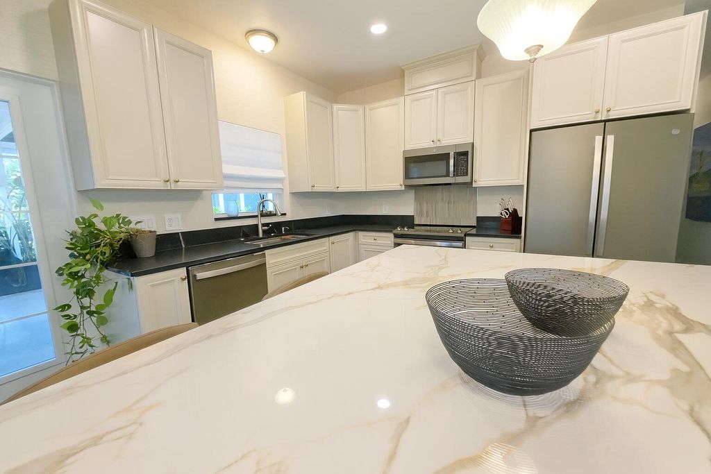 Photo of 513 E Whitney Drive, Jupiter, FL 33458 (MLS # R11145602)