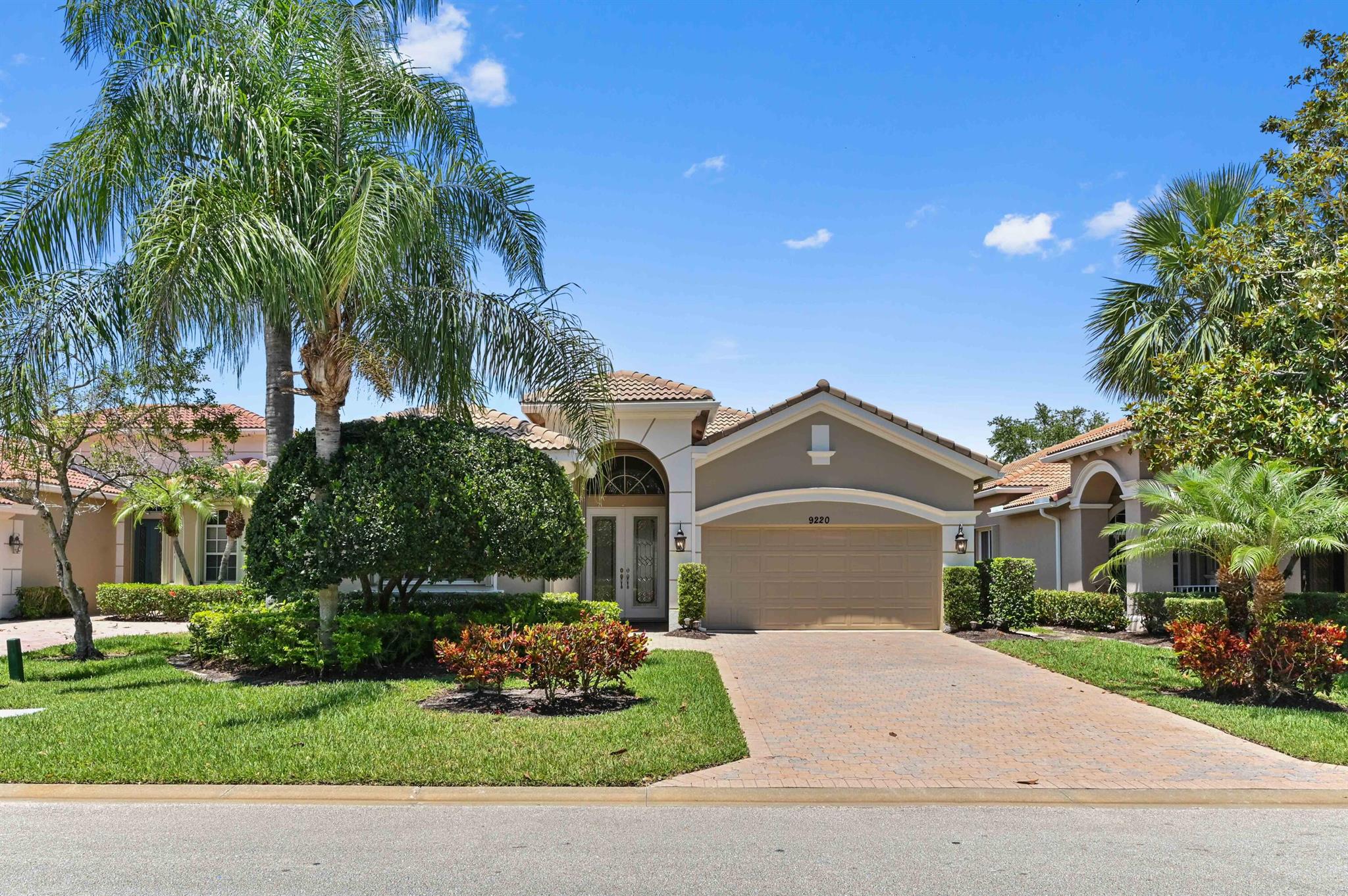 Presenting an impressive RIVIERA Model residence in the renowned PGA Village of Port St. Lucie, located at 9220 Short Chip Circle. This commendable property offers over 2100 square feet of living space, fashioned with clean lines and elegance throughout, boasting a new coat of fresh paint both inside and out.The layout of this residence caters to the needs of our contemporary lifestyle, showcasing a generous, open planned living and dining arrangement. The defining centerpiece of this area is the large, well-appointed kitchen flaunting sleek granite surfaces - a perfect setting to host and entertain, or enjoy casual meals.