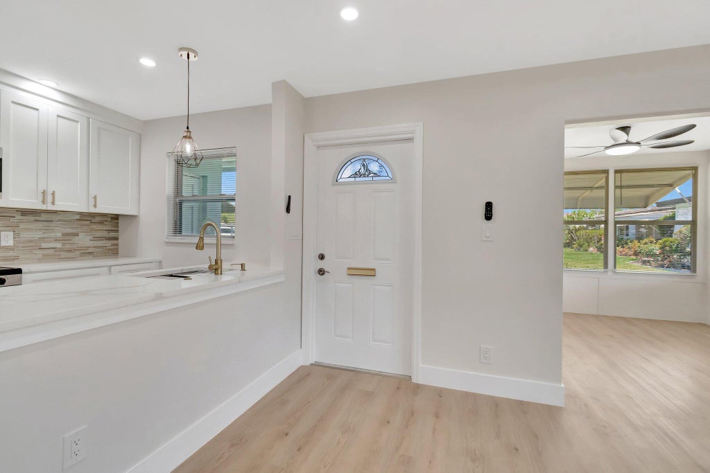 Photo of 470 High Point Drive #A, Delray Beach, FL 33445 (MLS # R11092510)