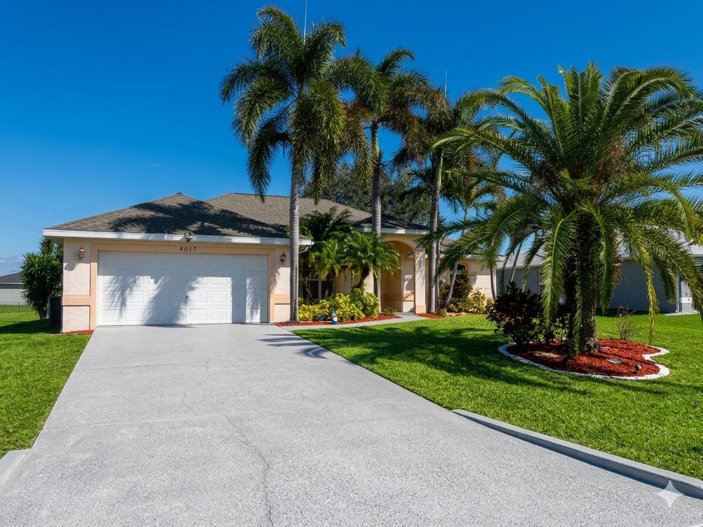 Photo of 4017 SW Kadlic Street, Port Saint Lucie, FL 34953 (MLS # R11164784)