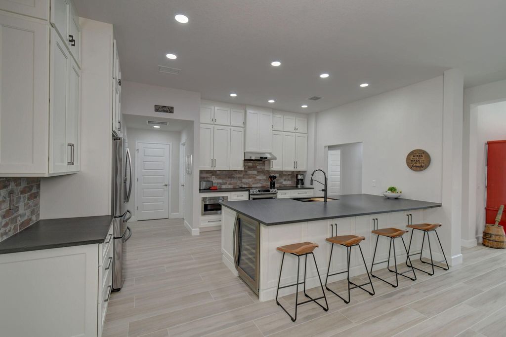 Photo of 8320 Amalfi Circle, Fort Pierce, FL 34951 (MLS # R10931864)