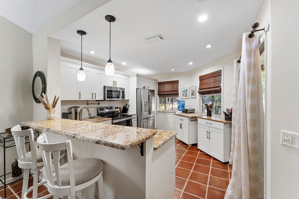 Photo of 6662 VIA REGINA, Boca Raton, FL 33433 (MLS # B26089878)