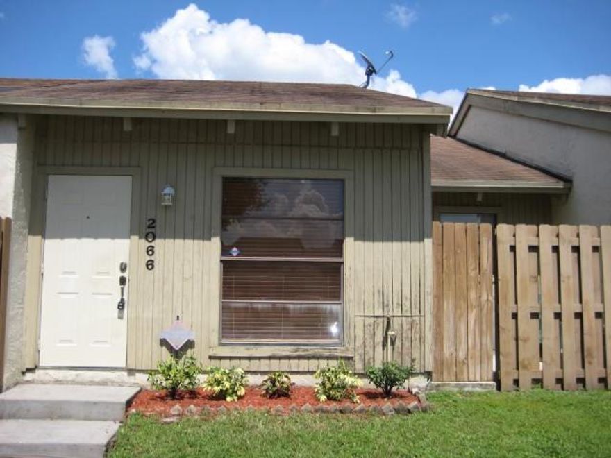 Updated and Fabulous!  2/2 Villa for Rent in in Davie, Florida. Beautifully Remodeled Gourmet Kitchen, Granite Counters and Stainless Steel Appliances.  2 Bedrooms, 2 Full Bathrooms, Tile and Wood Floors, Soaring High Living Room Ceiling, 2 Private Outdoor Fenced Patios, Washer and Dryer, Master Walk-In Closet and Central A/C.  Enjoy Arrowhead Golf and Tennis Club Amenities including Pool, Clubhouse, Playground and Tennis Courts.  Close to Nova University and just about everything! Fast and Easy Move In!