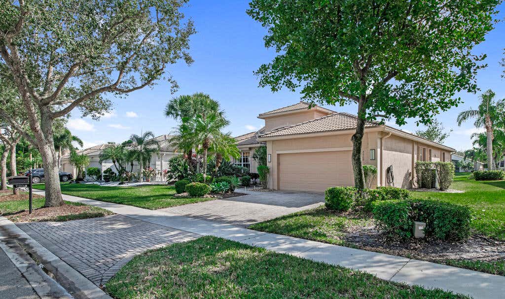 Photo of 7908 Amethyst Lake Point, Lake Worth, FL 33467 (MLS # R11049330)