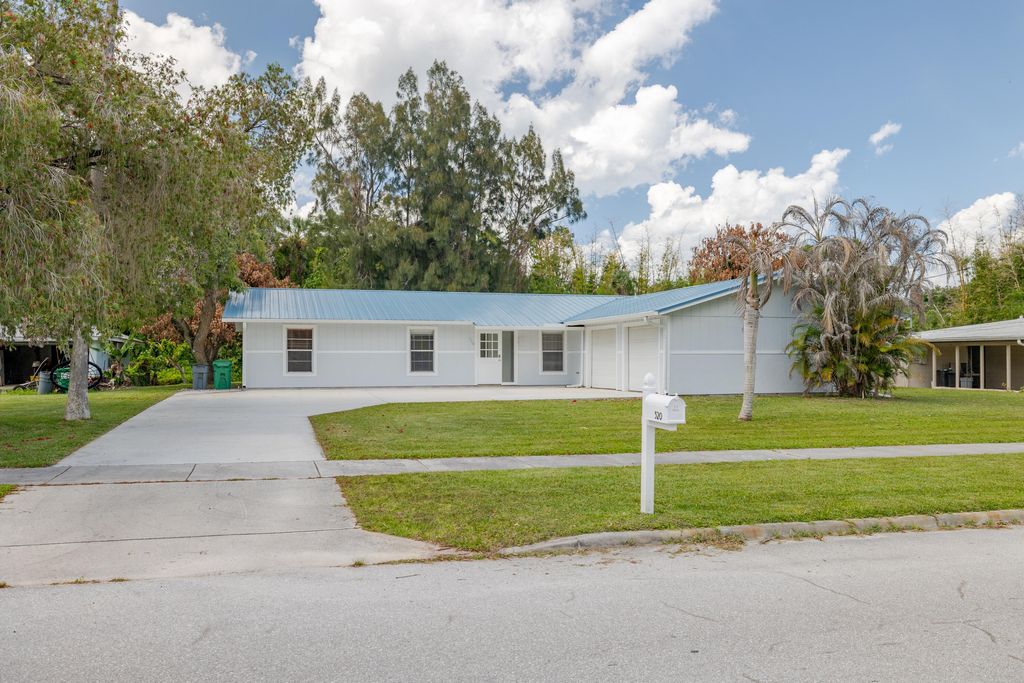 Photo of 320 Chamberlain Boulevard, Fort Pierce, FL 34946 (MLS # B26018643)