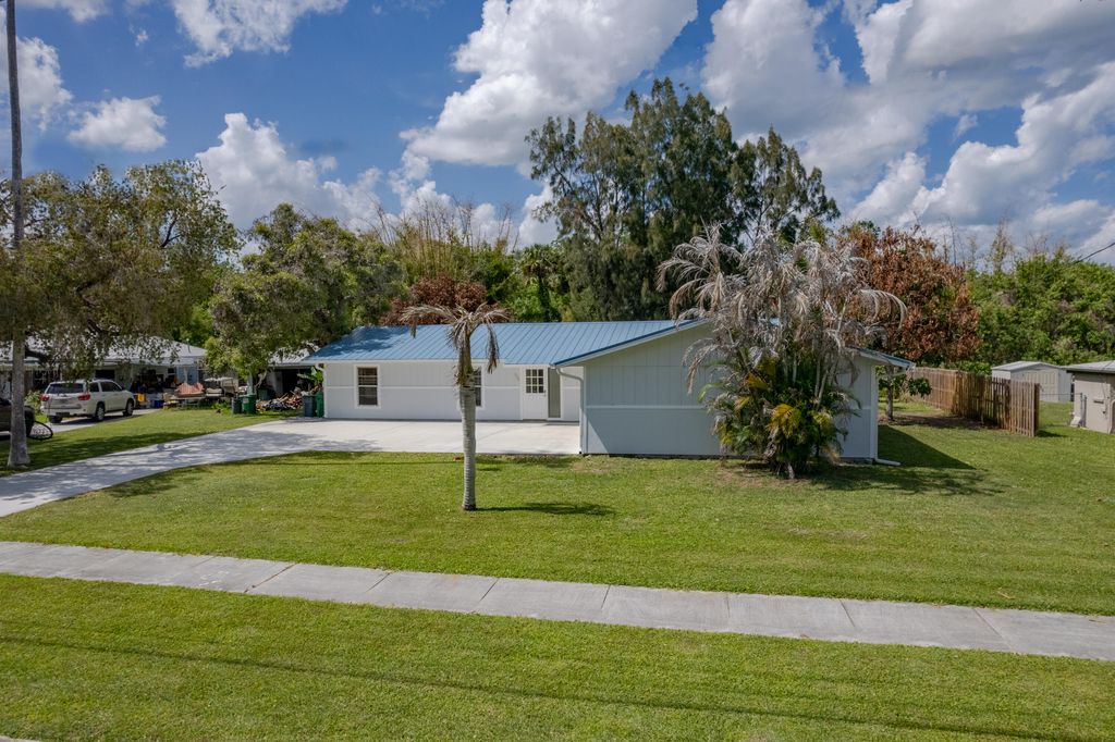 Photo of 320 Chamberlain Boulevard, Fort Pierce, FL 34946 (MLS # B26018643)