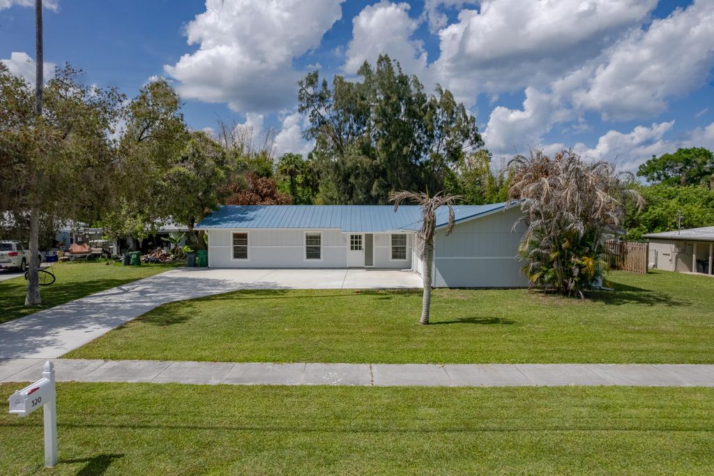 Photo of 320 Chamberlain Boulevard, Fort Pierce, FL 34946 (MLS # B26018643)