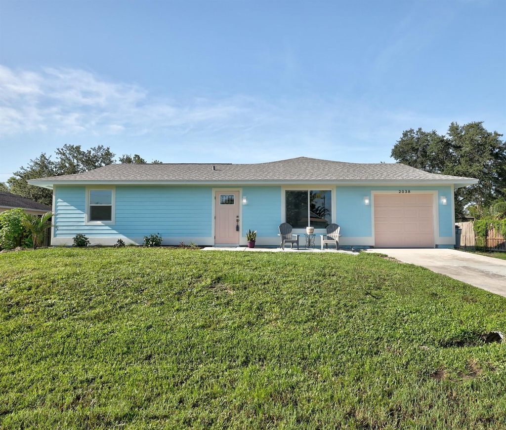 Photo of 2038 SW Grant Avenue, Port St Lucie, FL 34953 (MLS # R10908950)