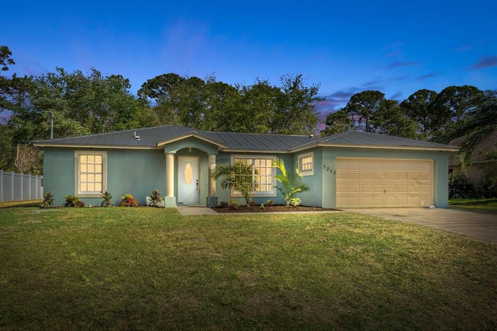 Photo of 3073 SW Collings Drive, Port St Lucie, FL 34953 (MLS # R10872500)