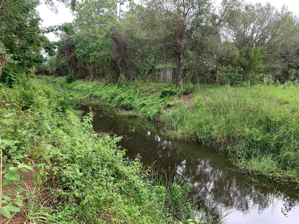 Great raw building lot in quiet residential area of Port St Lucie. This lot backs up to a moderate sized drainage canal which provides more privacy and view. Adjacent lot at 1630 SW Buttercup available separately or as a package deal.