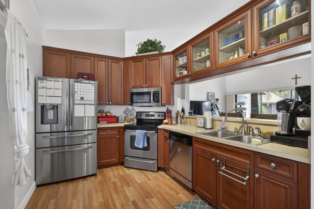 Photo of 12644 Shoreline Drive #8F, Wellington, FL 33414 (MLS # B26076266)