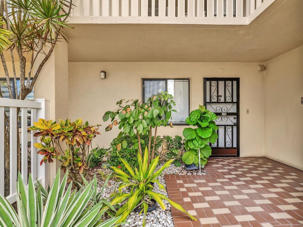 Photo of 14426 Amberly Ln #108, Delray Beach, FL 33446 (MLS # F10521420)