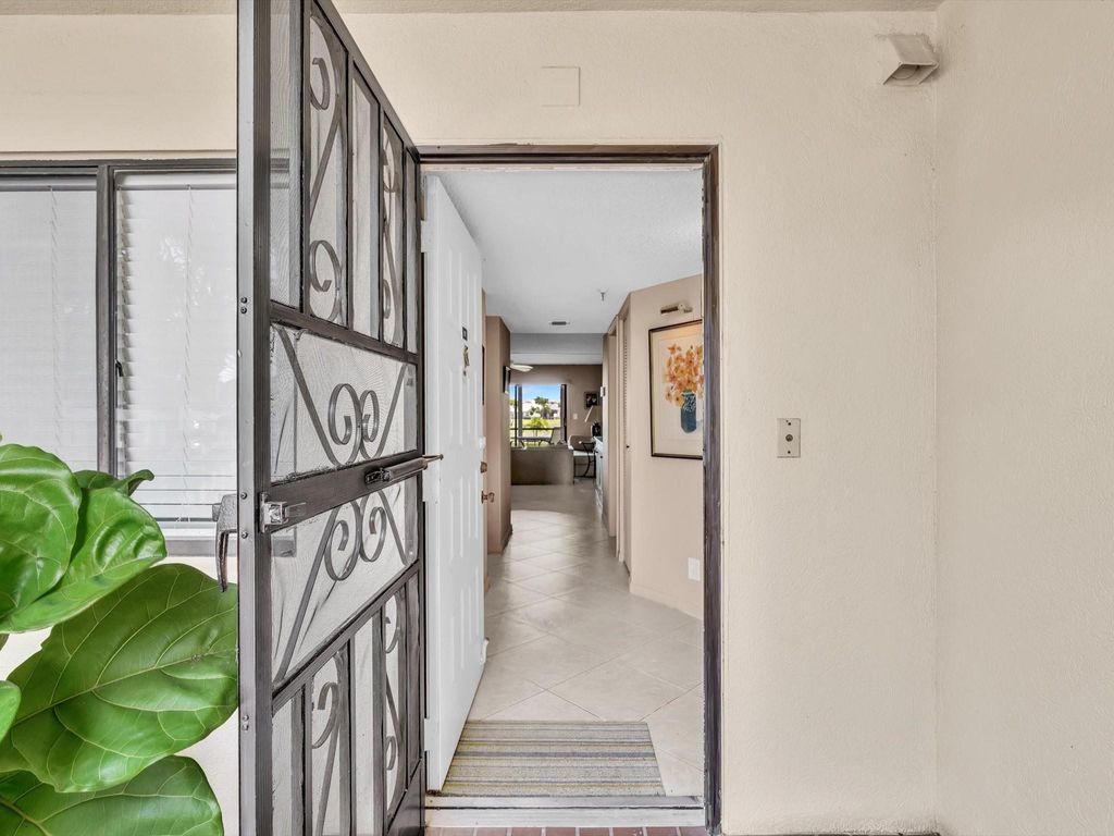 Photo of 14426 Amberly Ln #108, Delray Beach, FL 33446 (MLS # F10521420)