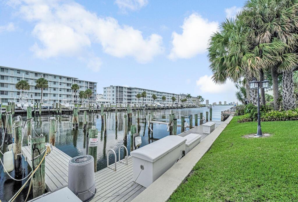 Welcome to this spacious and inviting 2-bedroom, 2-bath condo located directly on the desirable Earman River.This freshly updated second-floor condo offers the perfect combination of comfort, convenience, and waterfront living. Freshly painted throughout with brand new carpeting, each of the two large bedrooms has their own ensuite bathroom and walk-in closet. For boating and water enthusiasts, docks are available to rent monthly,providing direct access to the river and beyond. Relax on quiet mornings with the serene waterfront just outside your door, or enjoy evenings watching boats pass by in this scenic setting. This community's sought-after location combines tranquil riverfront living with close proximity to to shopping, dining, and all the best that North Palm Beach has to offer.
