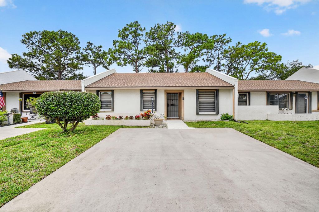 Photo of 6105 Fairfield Circle, Greenacres, FL 33463 (MLS # B26020353)