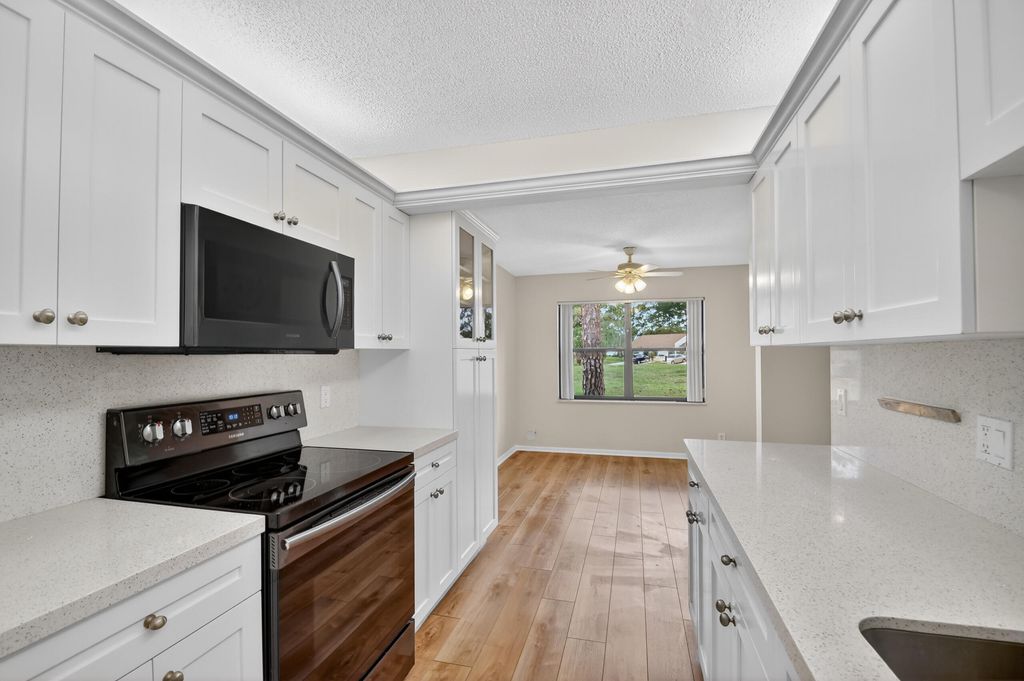 Photo of 6105 Fairfield Circle, Greenacres, FL 33463 (MLS # B26020353)