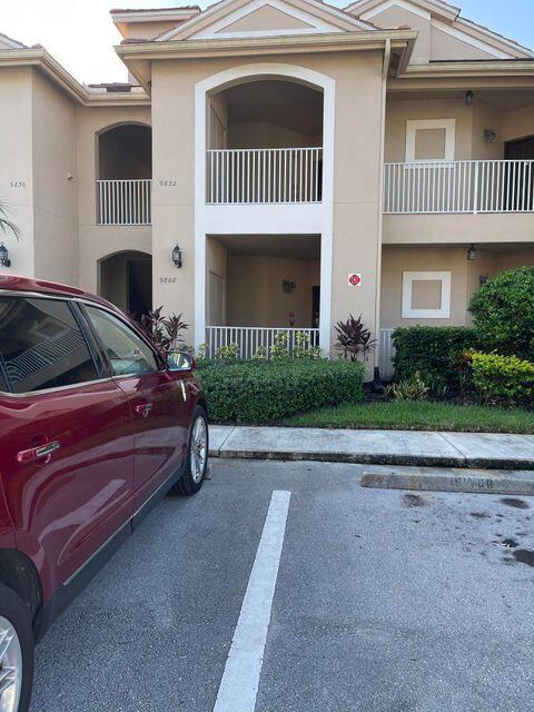 Laminate flooring in the living room and bedrooms. Located on the less congested side/quieter side of the the Golf Villas and just up the street from the PGA's clubhouse. It has a nice, heated community pool.