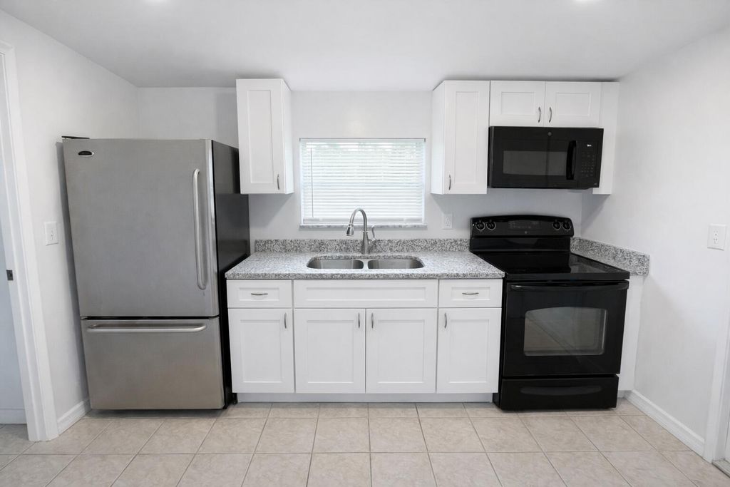 Photo of 5010 Killarney Avenue #B, Fort Pierce, FL 34951 (MLS # B26021166)