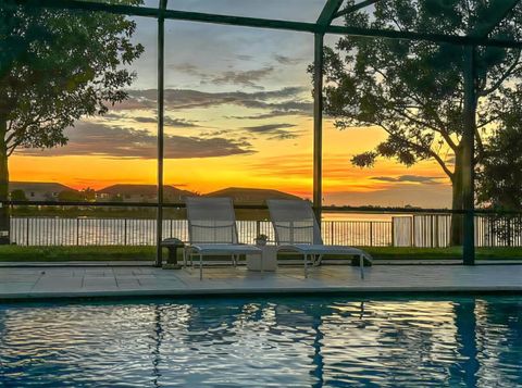 Photo of 8471 Miralago Way, Parkland, FL 33076 (MLS # B26010827)