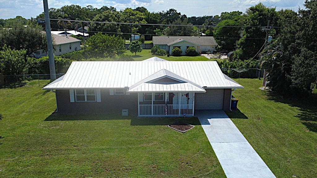 Photo of 5572 SE CABLE Drive, Stuart, FL 34997 (MLS # B26067582)