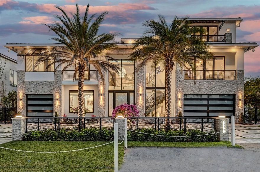 New elegantly furnished 3 story gated estate home. One of the most unique waterfront locations in Boca Raton. Located on the edge of the intracoastal. Breath taking intracoastal views from front & back. Nearly 10,000 sq ft of luxury living. Glass elevator, sealed waterfall interior entry. Chef's kitchen plus fully equipped catering kitchen. $300,000 Crestron automation system. 16 TV's. Furniture & art work are some of the highest level money can buy. Walk in wine room & bank vault type security room. Master suite w/fireplace, 2 sitting areas & juice bar. His & hers baths. Her bath has beauty salon. Theater w/state of the art equipment. Gym w/mini kitchen & steam room & built in shower. Pool w/fountains, heated spa & full summer kitchen. Rooftop w/spa & summer kitchen. Full house generator.